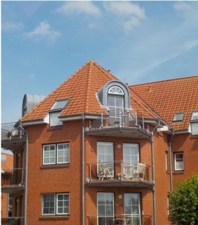 Отель Residenz Rosengrund mit Schwimmbad und Sauna  Бюзум